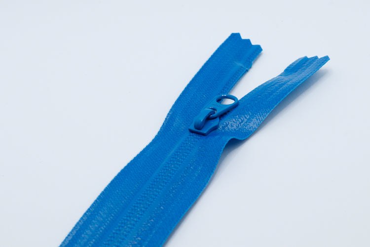 Blue Closed-end YKK AquaGuard Zipper. Custom requests and bulk quantities available.