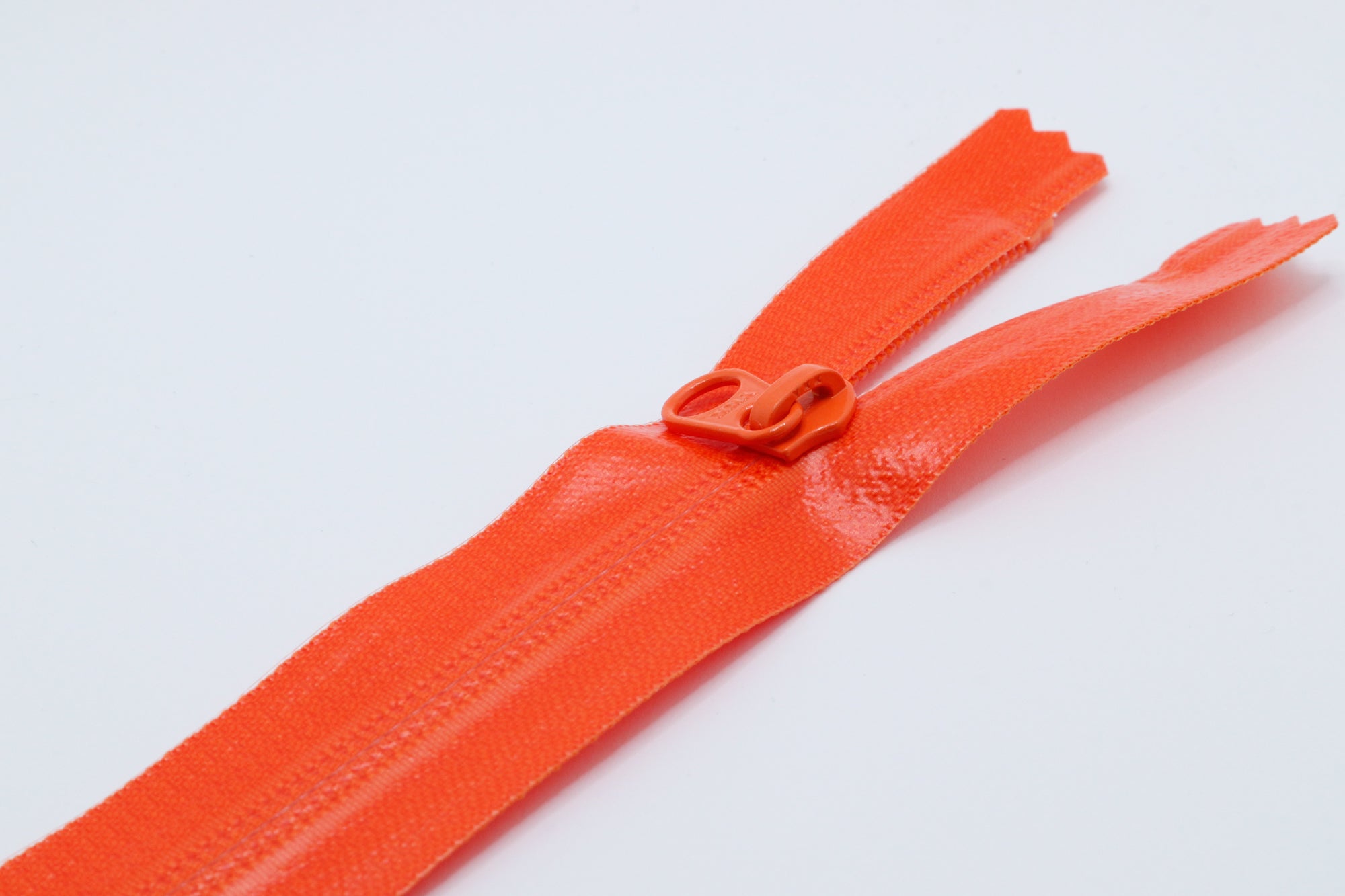 Orange Closed-end YKK AquaGuard Zipper. Custom requests and bulk quantities available