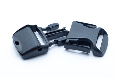 Black acetal cam buckle with the clamp lever lifted open