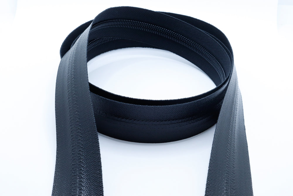 YKK AquaGuard water-resistant coil zipper chain by the foot in black